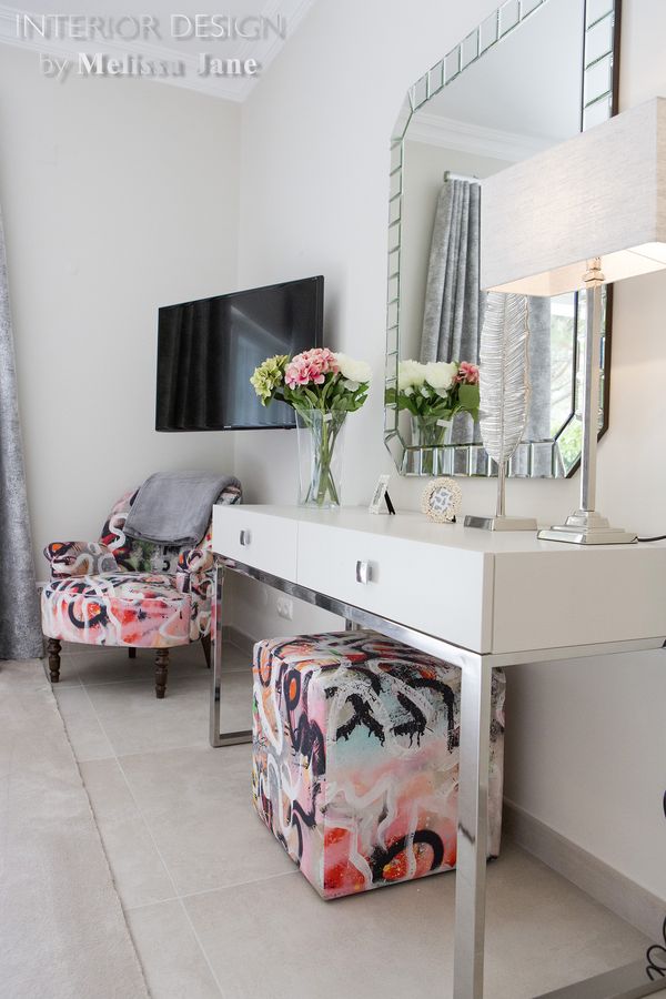 Dressing area with white vanity, mirror and patterned poufs — Quinta Verde, Algarve
